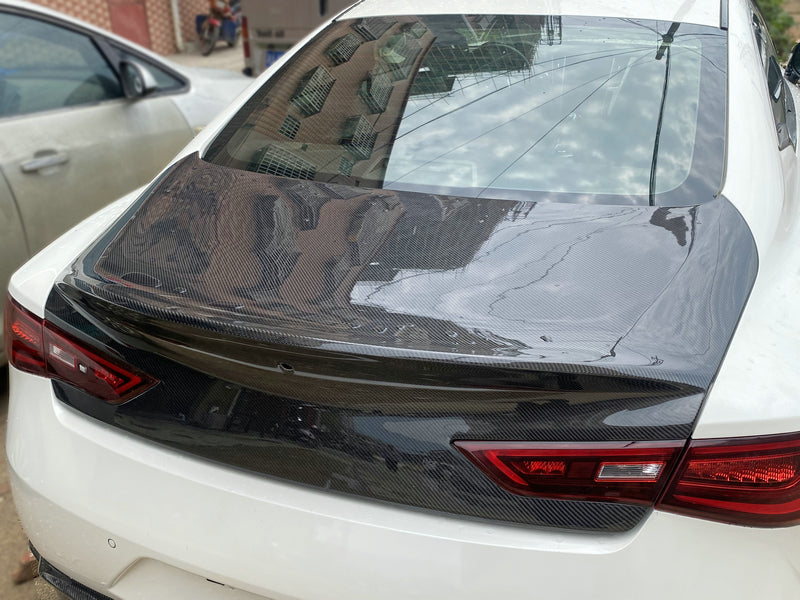Q60 Trunk lid with molded spoiler