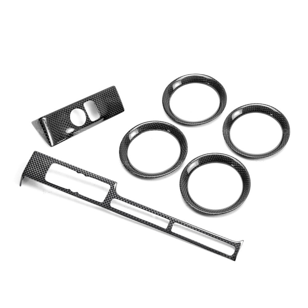 Seibon CFI0910NSGTR-D Carbon fiber interior trim set (6 pcs) for 2009-2016 Nissan GTR. Pieces include: mirror control panel cover (1), navigator cover (1), air vents cover (4)